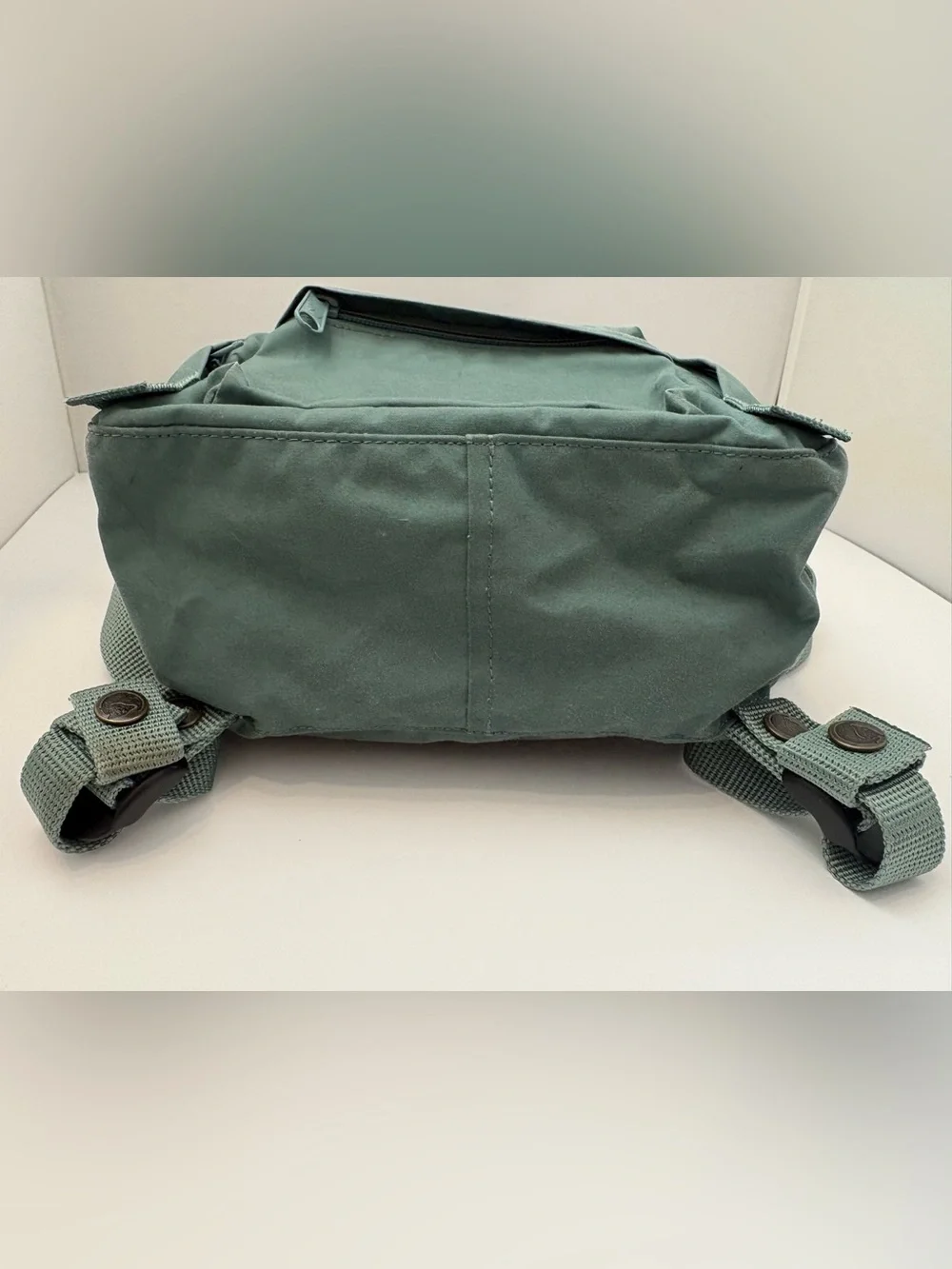 Fjallraven Kanken Mini Backpack in Sage Green with Red Logo